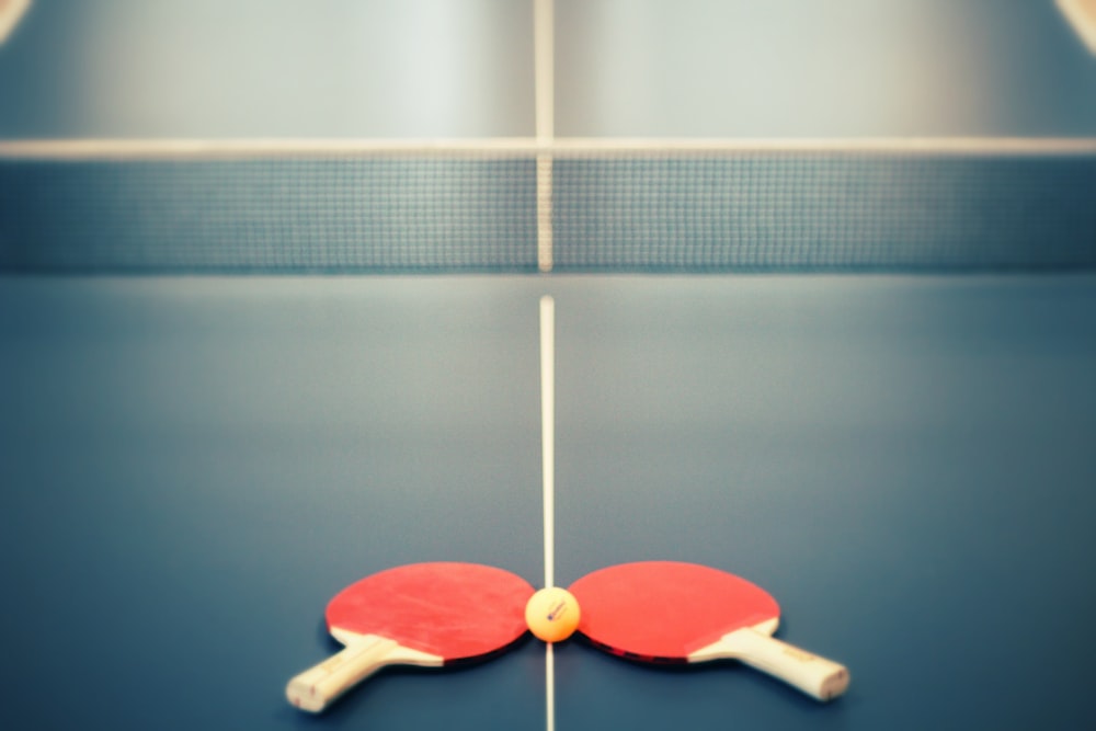 red and white wooden toy