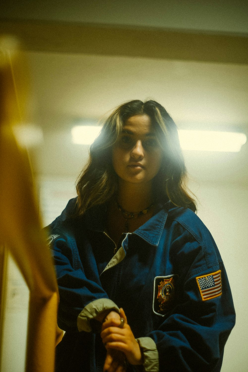 woman in blue and white adidas zip up jacket