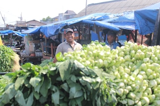 A friendly local market scene showing fresh produce and handmade food products.