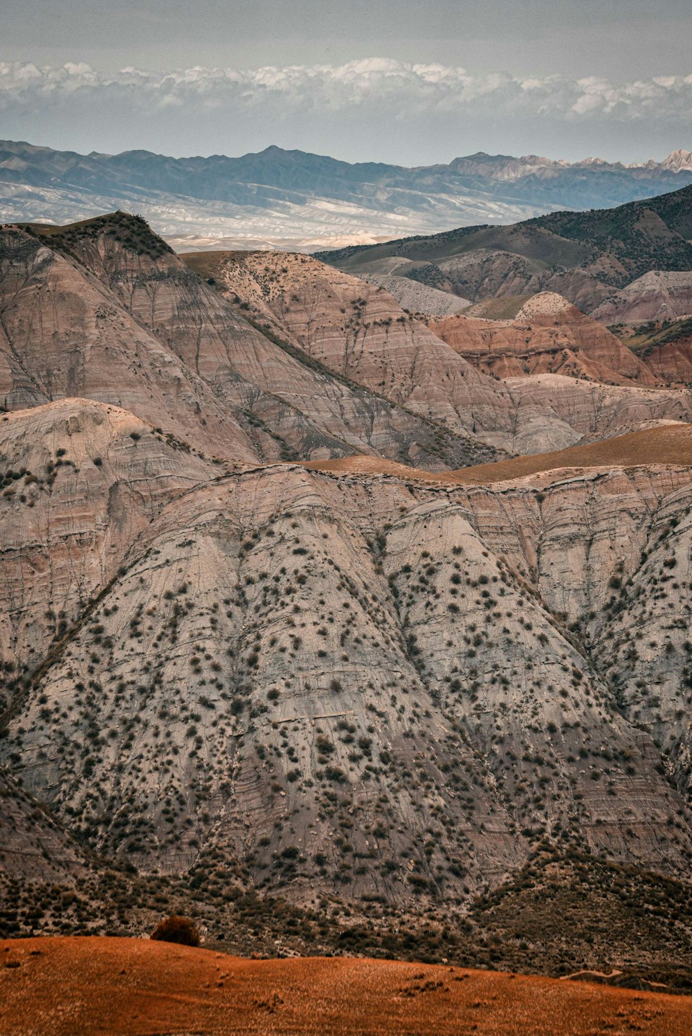 brown and white mountains under blue sky during daytime