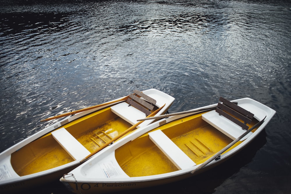 yellow and white boat on water