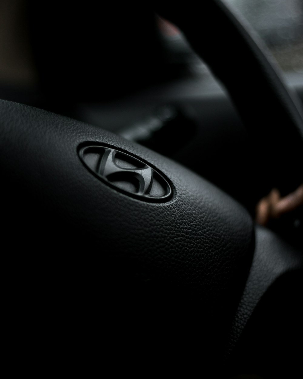 black and gray toyota steering wheel