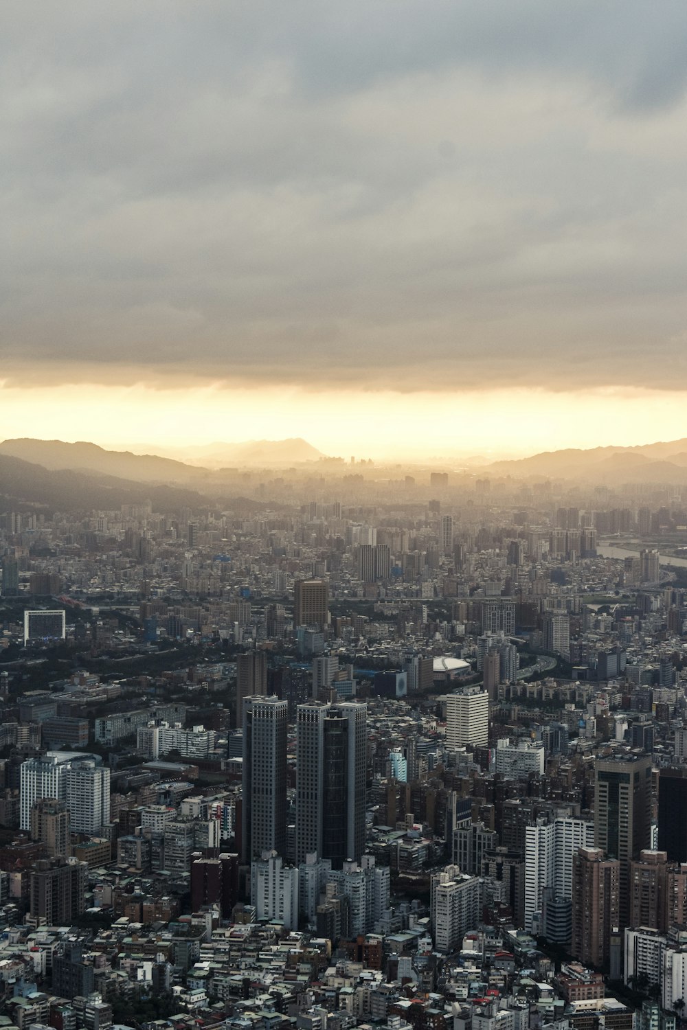 aerial view of city buildings during sunset