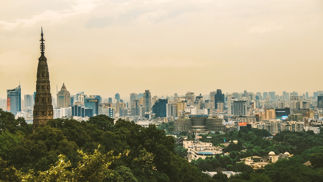 city with high rise buildings during daytime