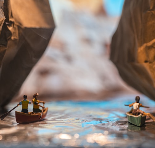 brown boat on water during daytime