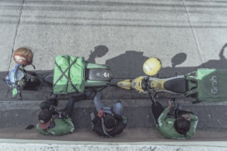 green and yellow motorcycle on road