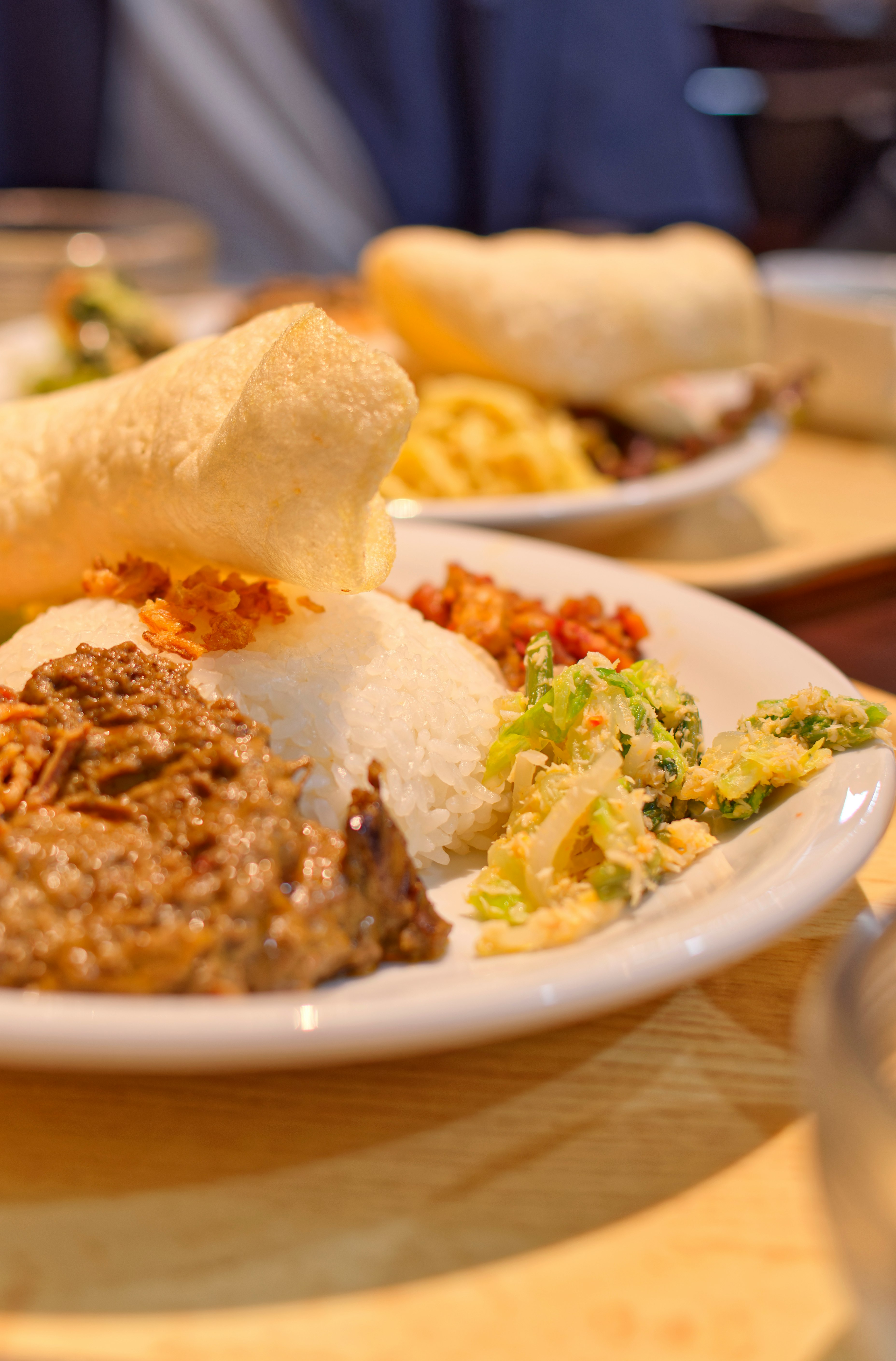 white ceramic plate with rice and fried chicken