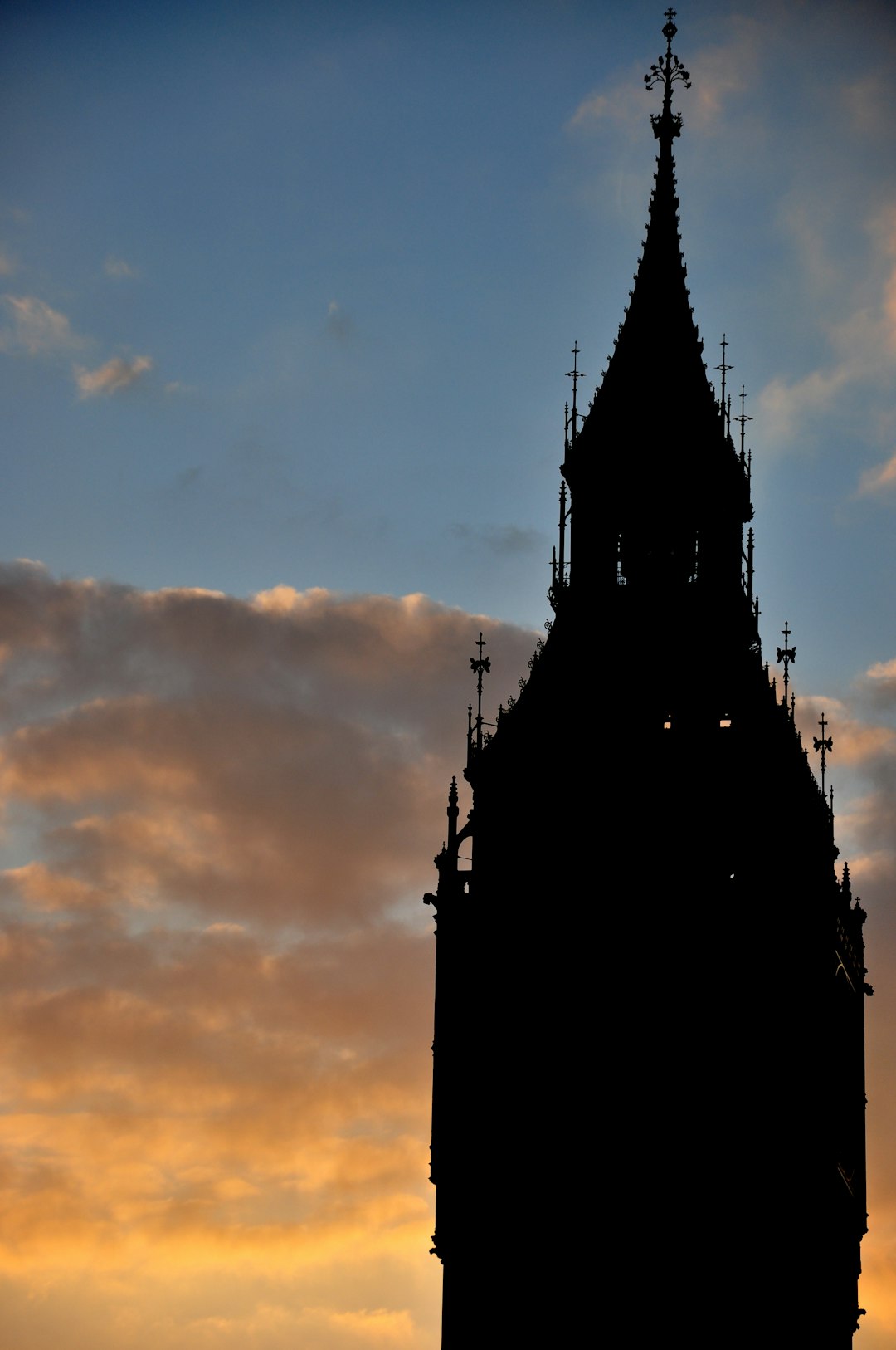 silhouette of building during sunset