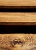 Close-up of wooden planks with natural grain and warm tones.