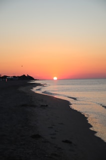 A beautiful sunset on a serene Indian beach.