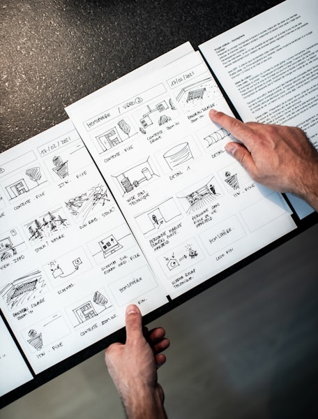 Hand-drawn storyboard panels annotated with camera moves and framing notes