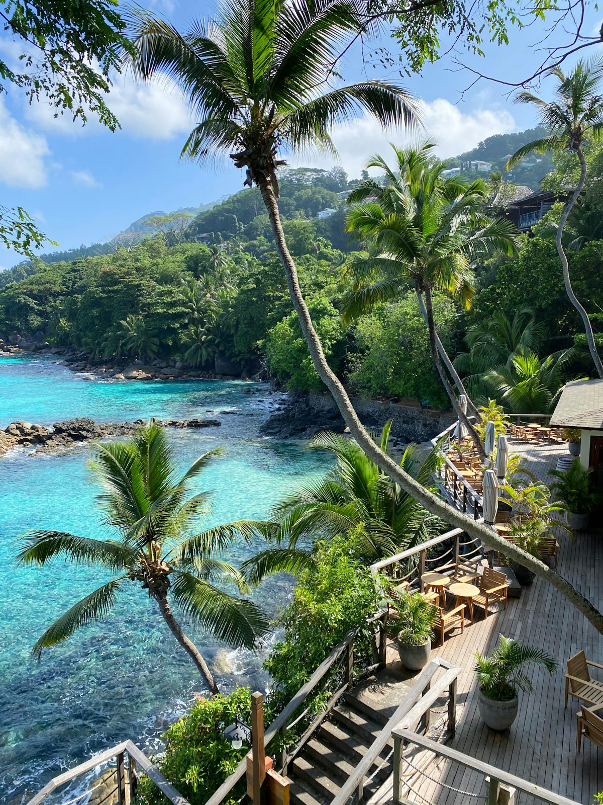 Seychelles February — turquoise lagoon and granite rock formations on a Seychelles beach with the monsoon easing