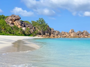 Crystal-clear waters and white sands of Fernando de Noronha beach.