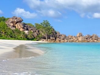 Crystal-clear waters and white sands of Fernando de Noronha beach.