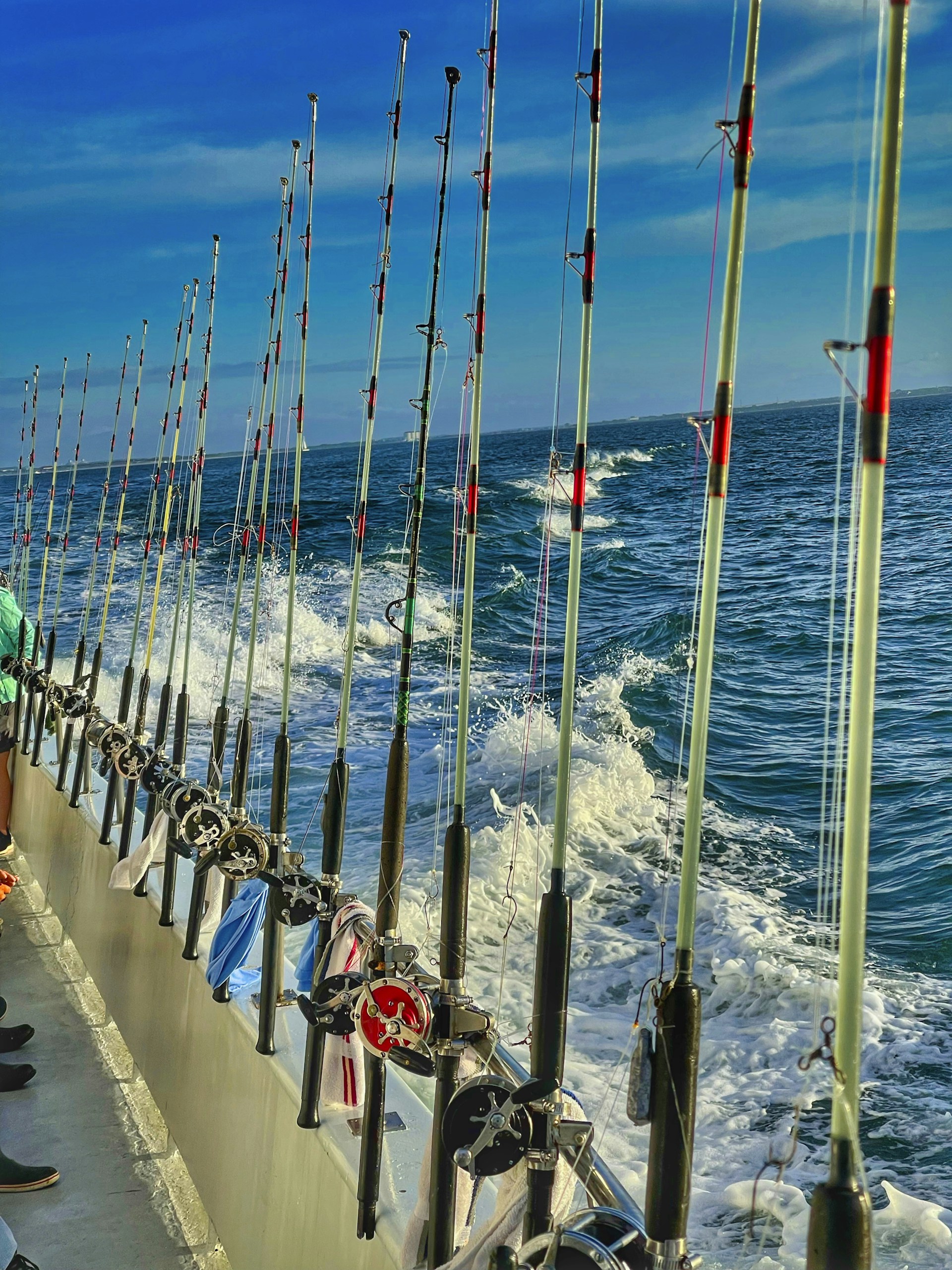 A cozy fishing setup on board with all the gear ready, showing the full-service experience offered by Delpasofishing.