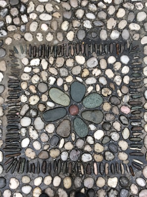 Different types of decorative stones arranged in a mosaic.
