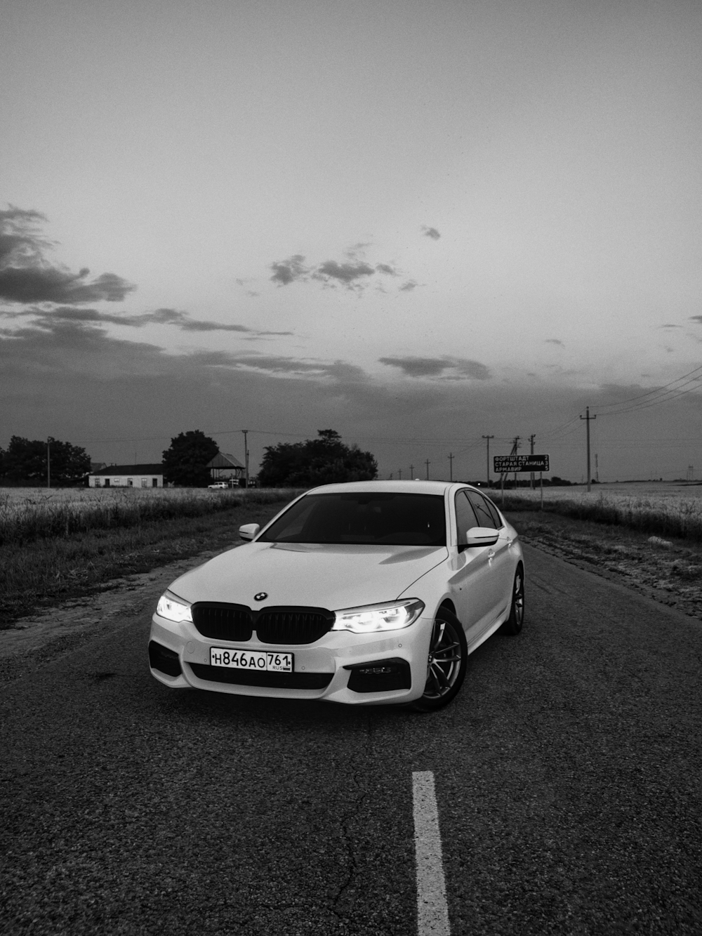 grayscale photo of white bmw m 3