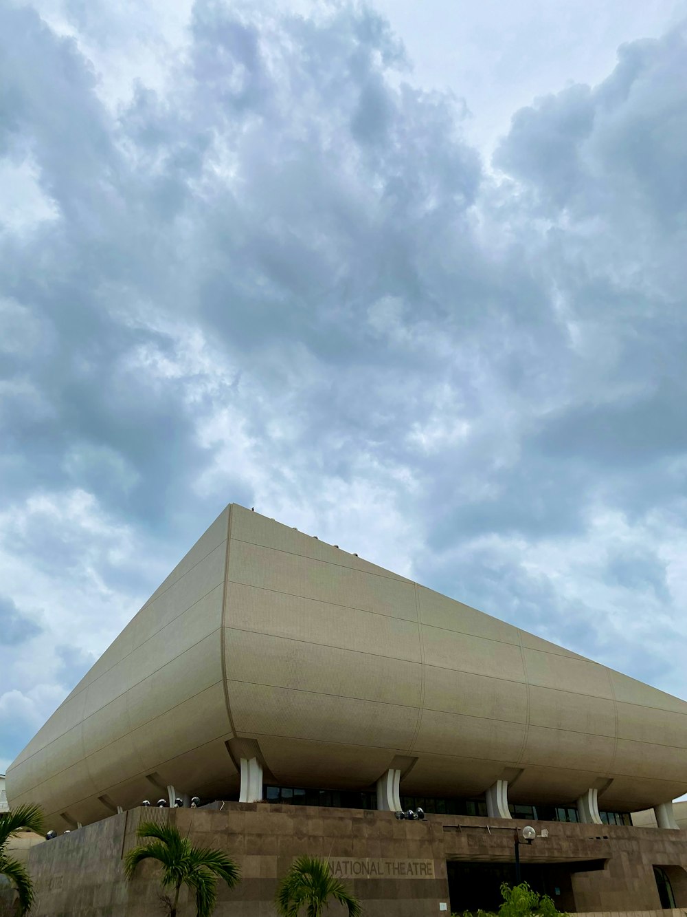 white concrete building under blue sky during daytime