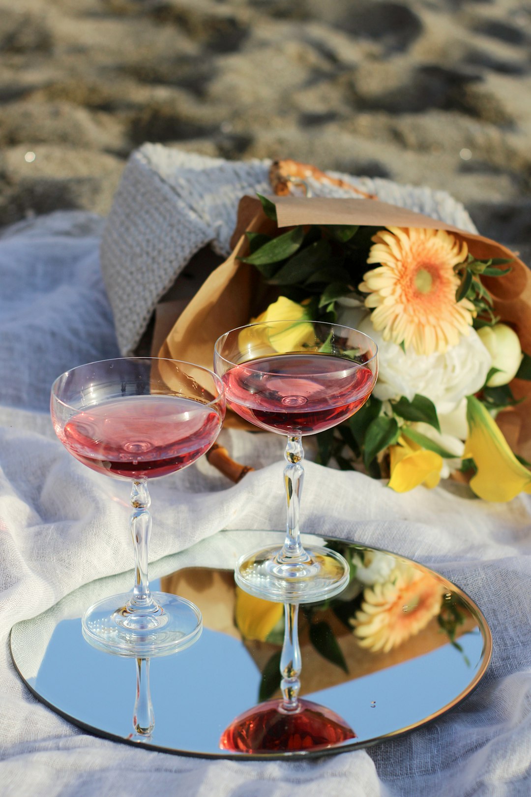 2 wine glasses with red liquid