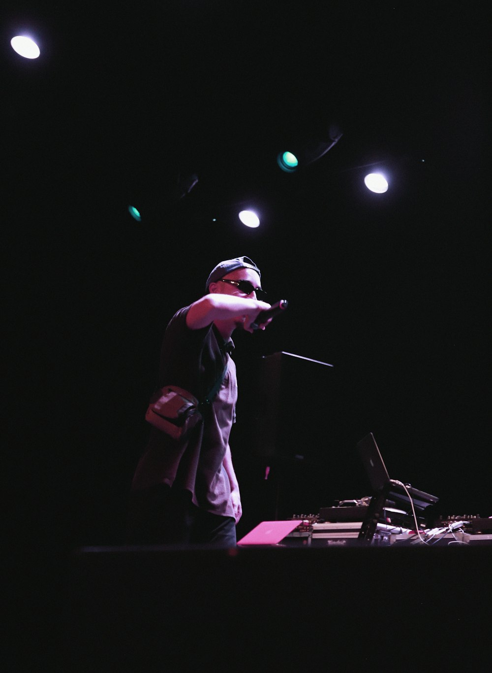 man in brown jacket playing piano