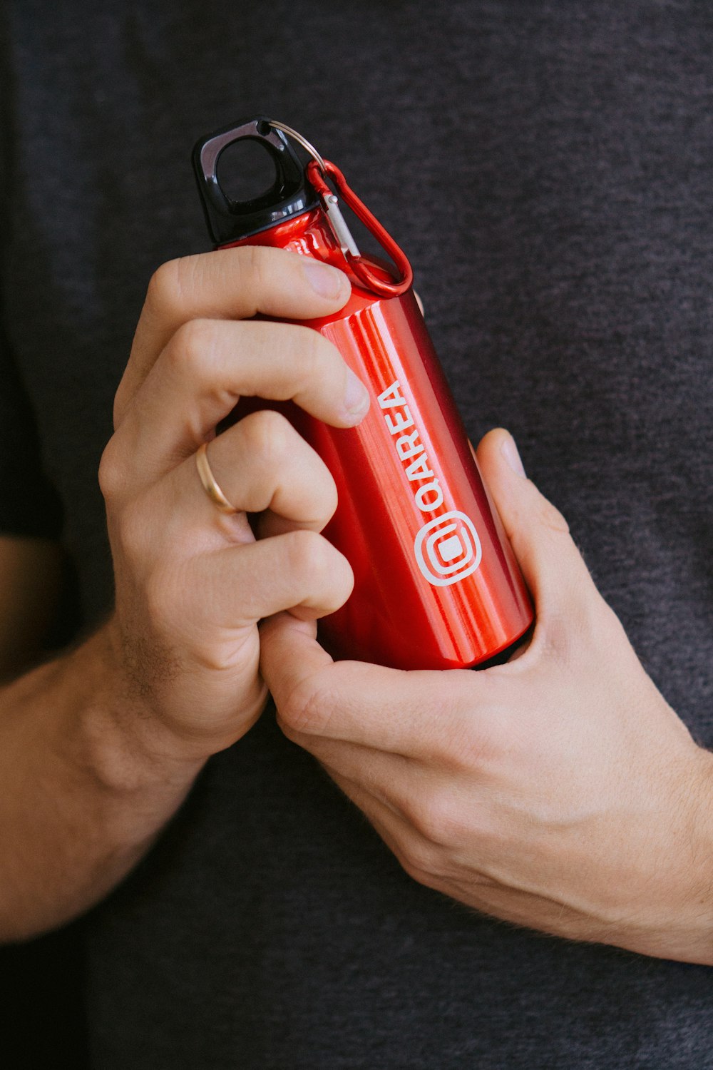 person holding red coca cola can