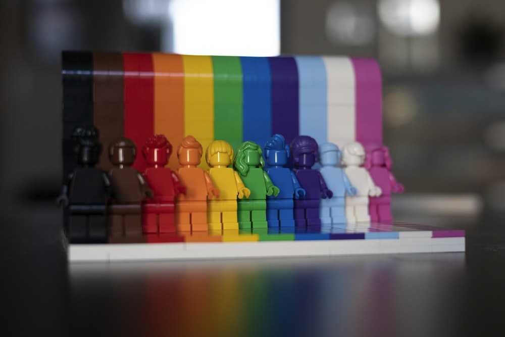 multi colored blocks on white shelf