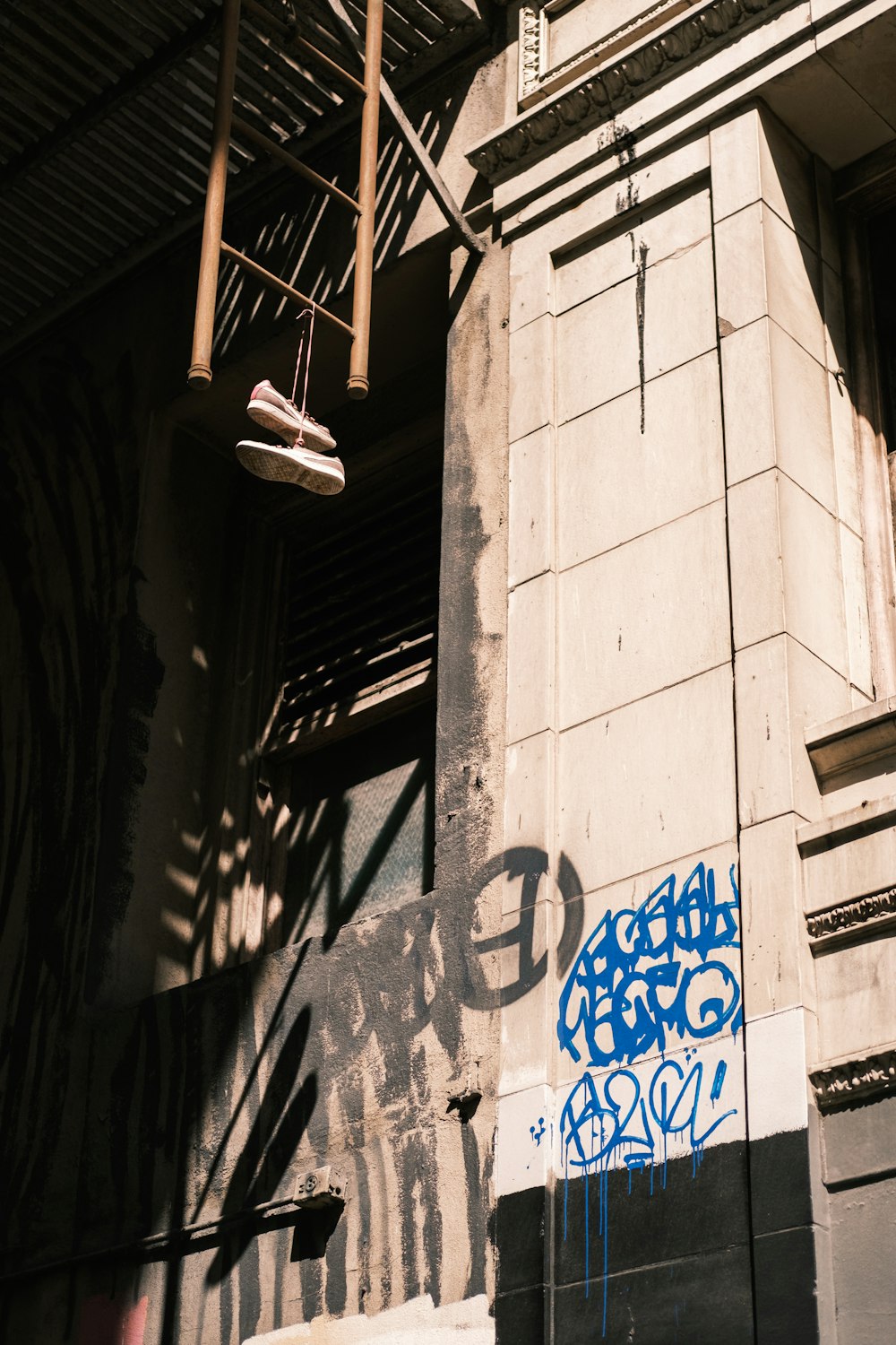 white and black graffiti on wall