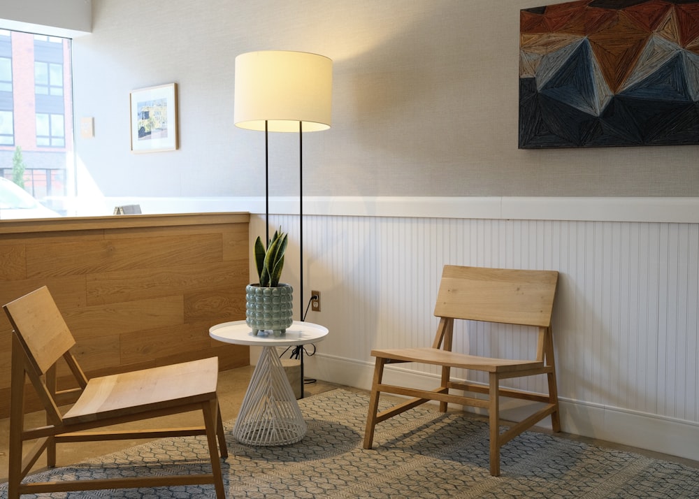 white and brown table lamp on brown wooden table