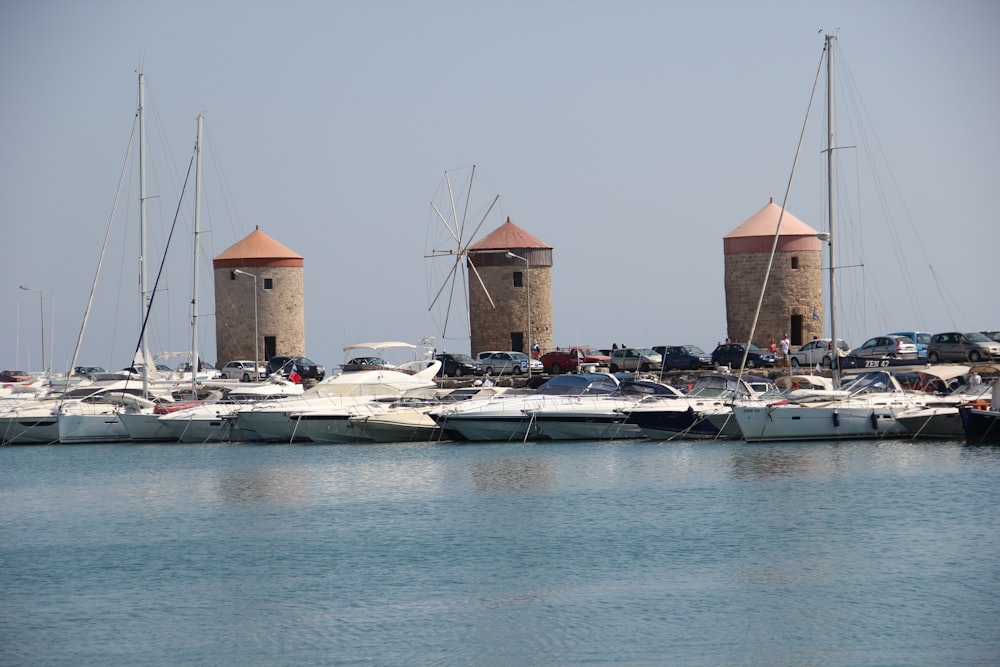 white and brown boats on sea during daytime