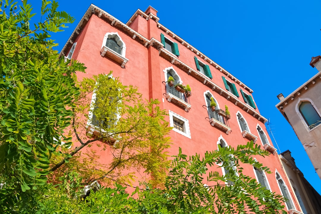 brown concrete building under blue sky during daytime