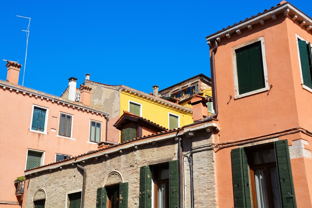 brown concrete building under blue sky during daytime