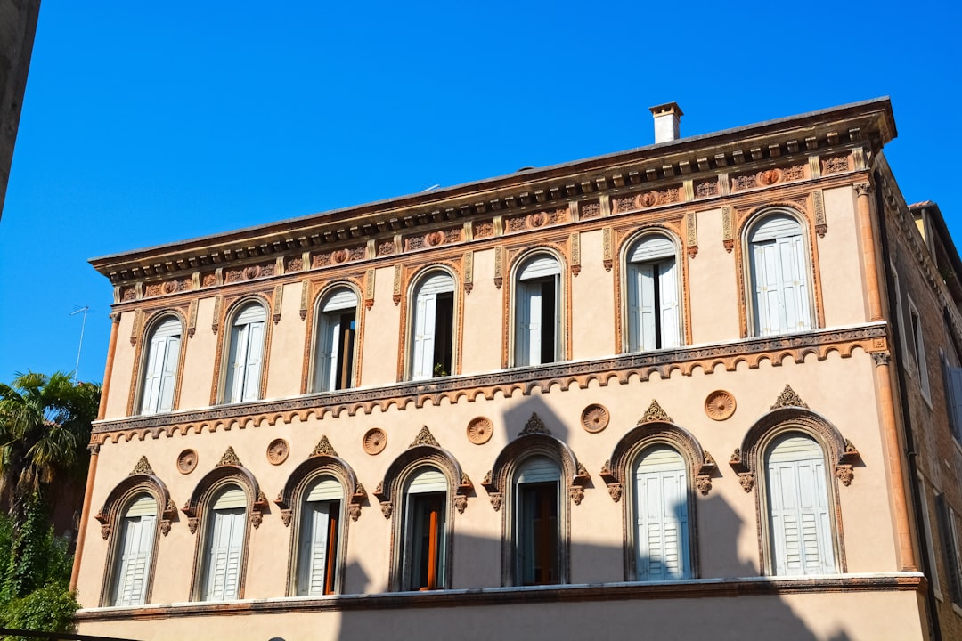 brown concrete building under blue sky during daytime