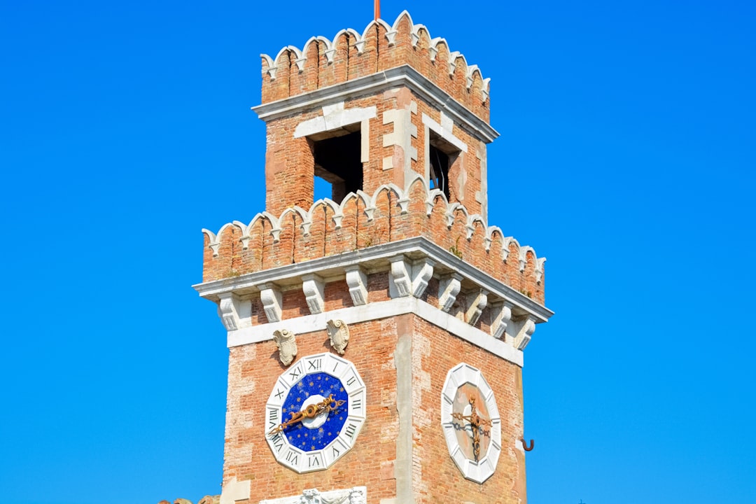 brown concrete building under blue sky during daytime