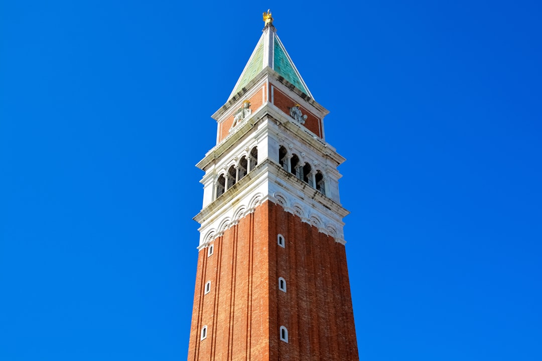 brown concrete tower under blue sky during daytime