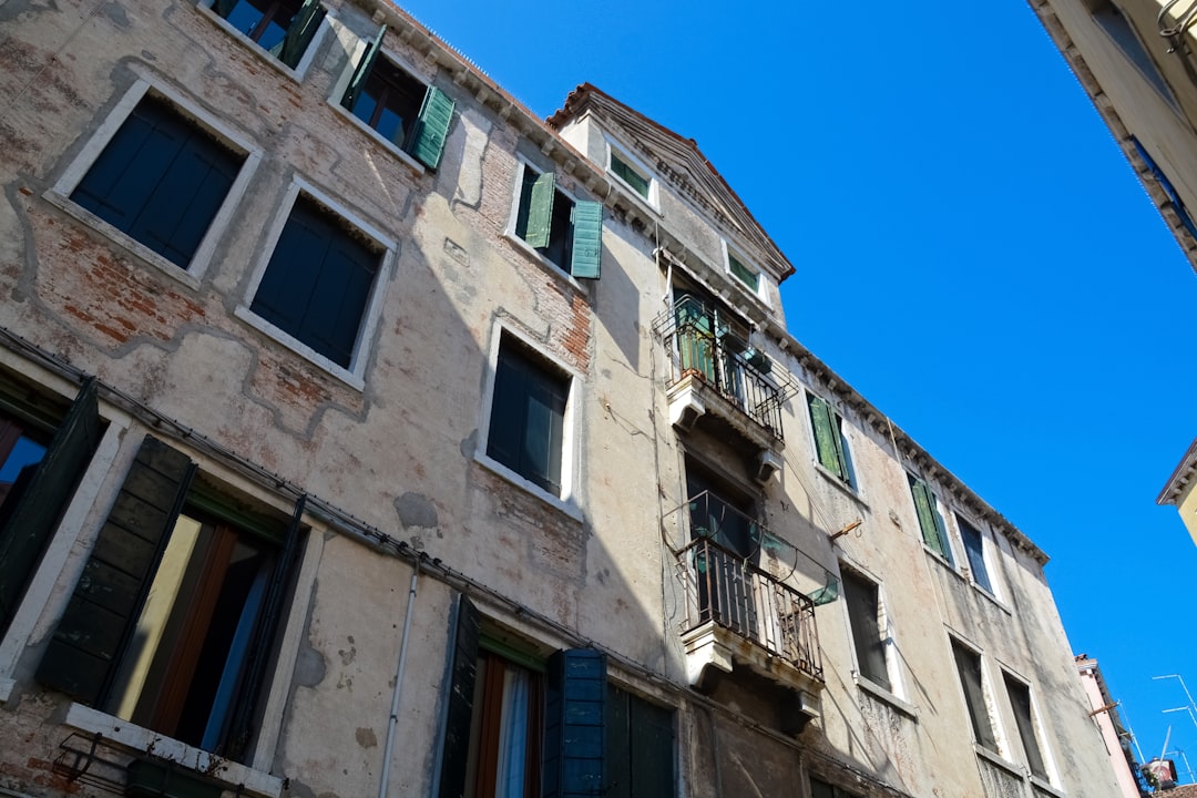 white concrete building under blue sky during daytime