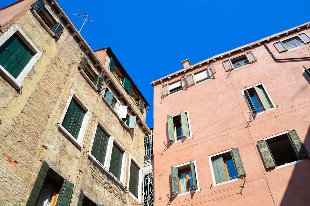 brown concrete building under blue sky during daytime