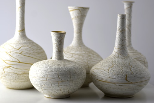white ceramic vase on white table