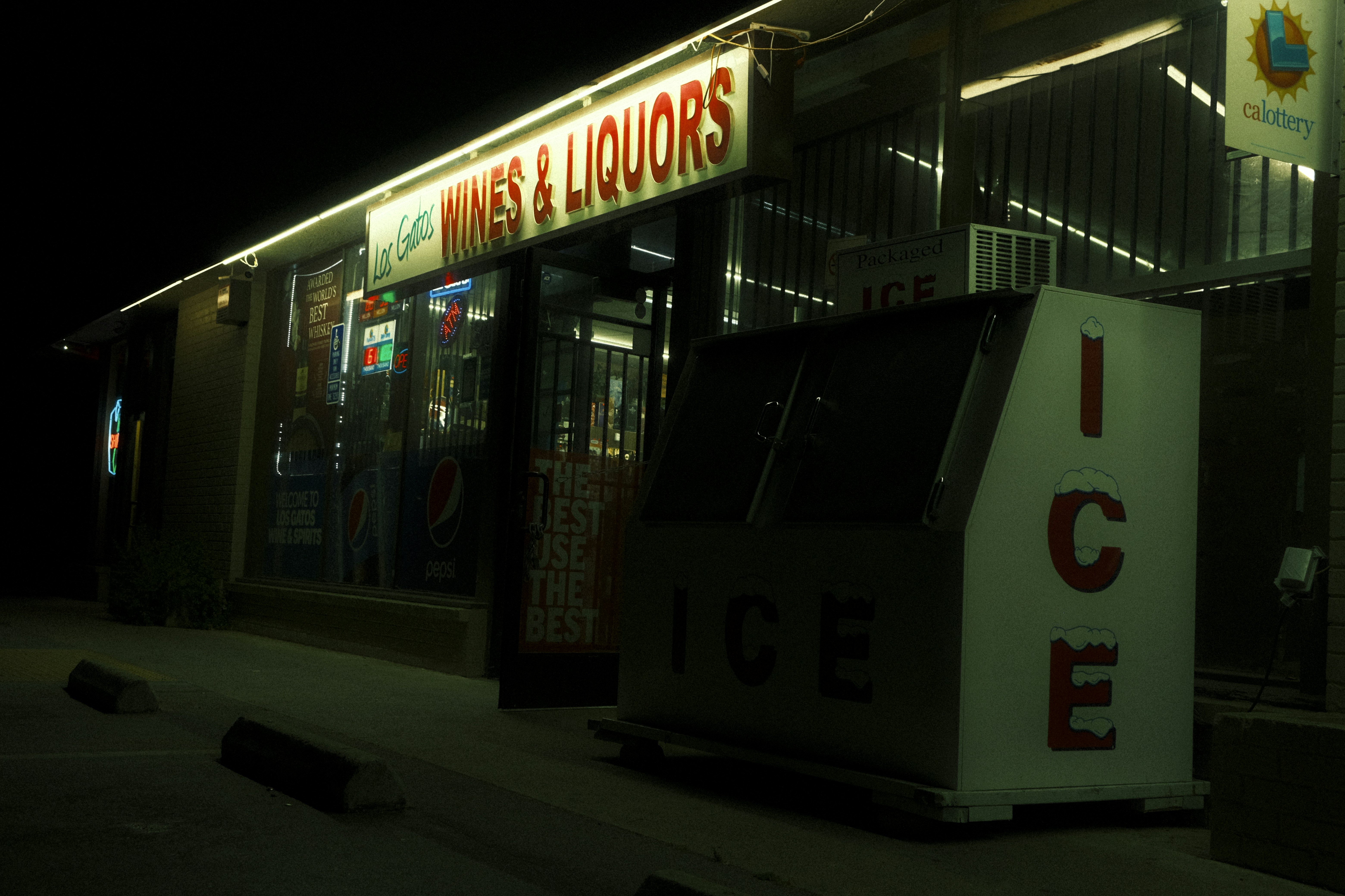 white and red UNKs store signage