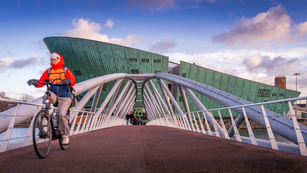 people walking on gray concrete bridge during daytime