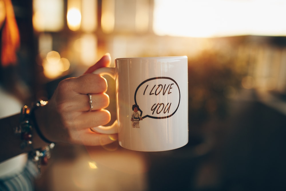 white ceramic mug with happy new year print