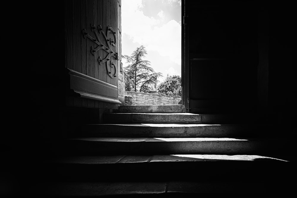 grayscale photo of concrete staircase