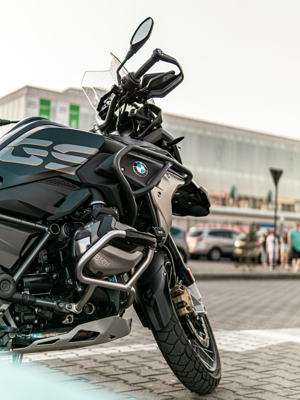 black and gray motorcycle on road during daytime