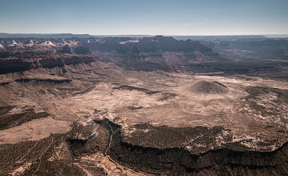 brown and gray mountains under blue sky during daytime