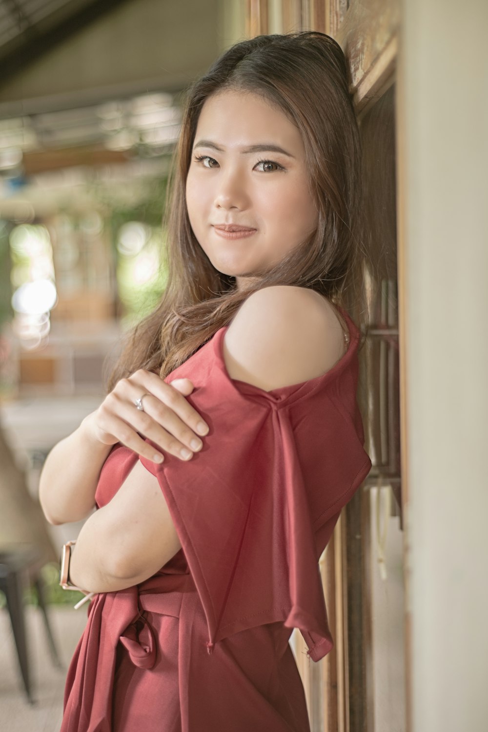 woman in red sleeveless dress