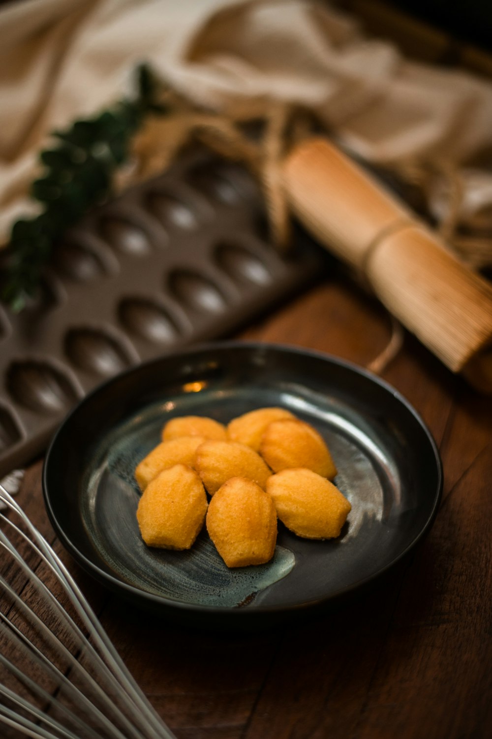 brown cookies on black round plate