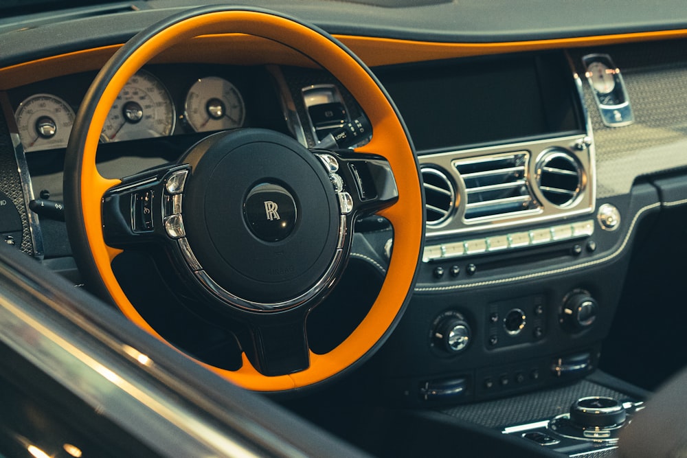 black and orange steering wheel