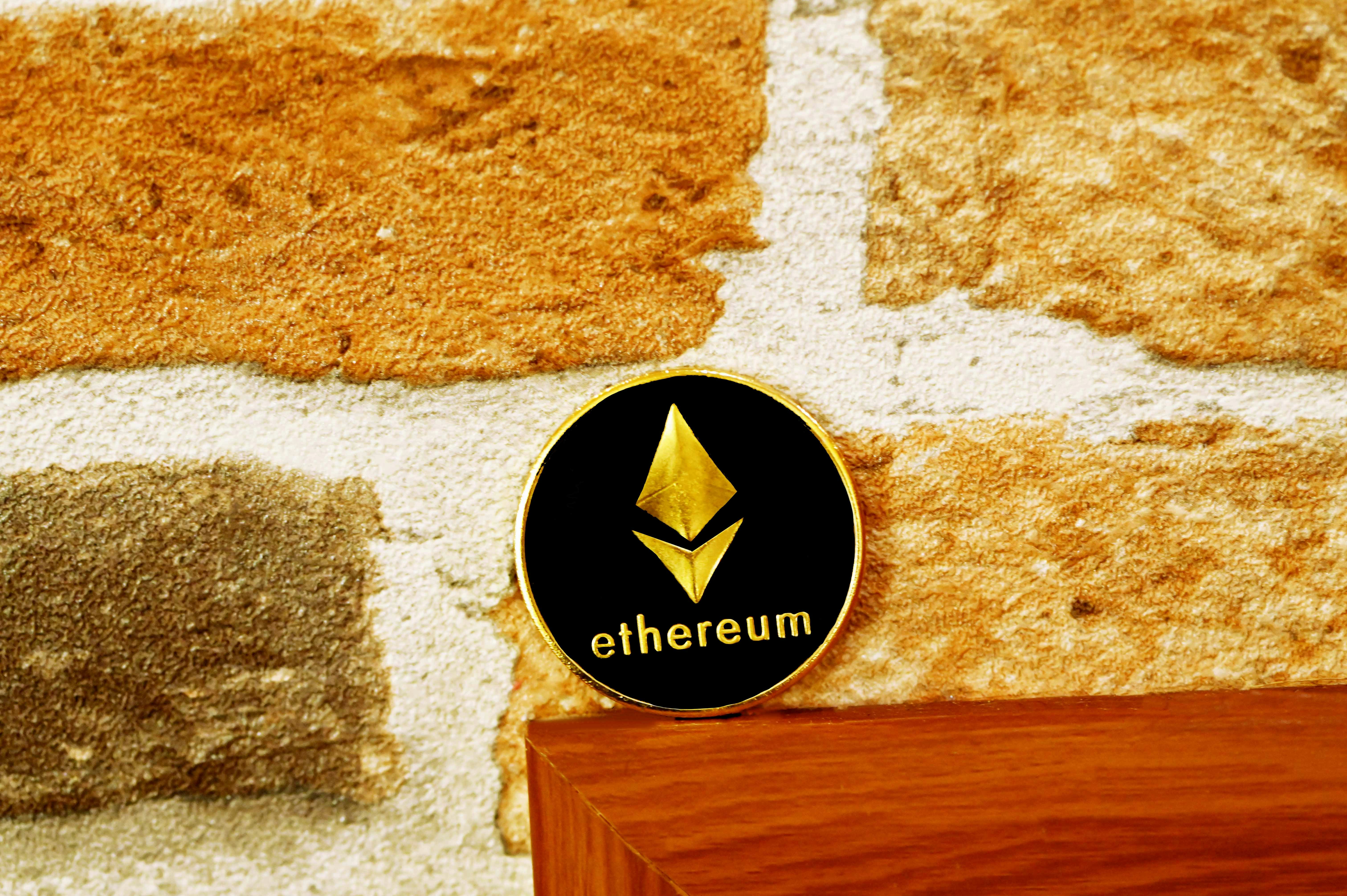 A black Ethereum coin stand on the table