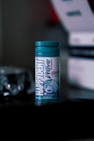 white and blue garlic powder bottle