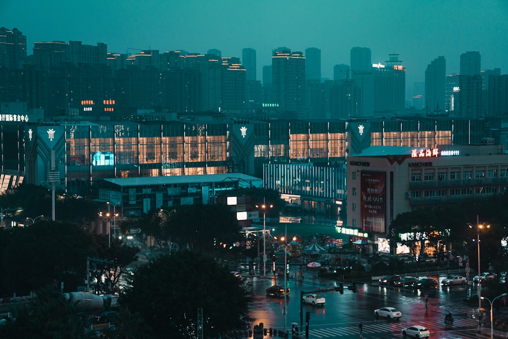 cars parked near building during night time