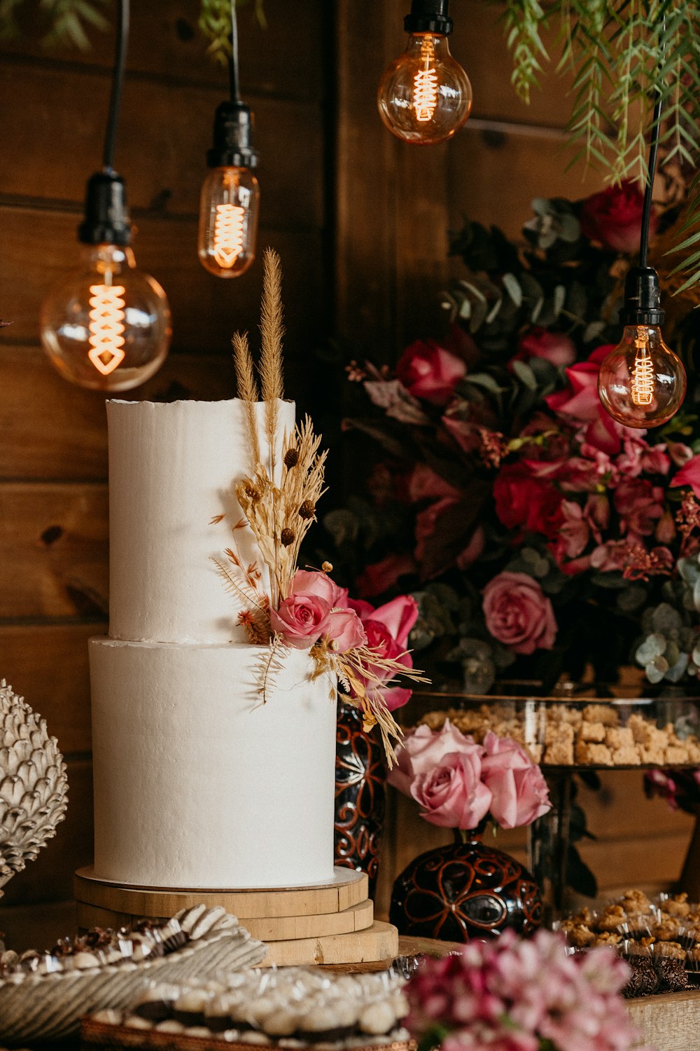 pink roses in white vase